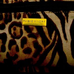 Plinio visiona purse